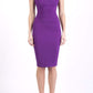 brunette model wearing diva catwalk lydia sleeveless pencil flattering fitted plain dress with split neckline and pleating across the body purple colour front