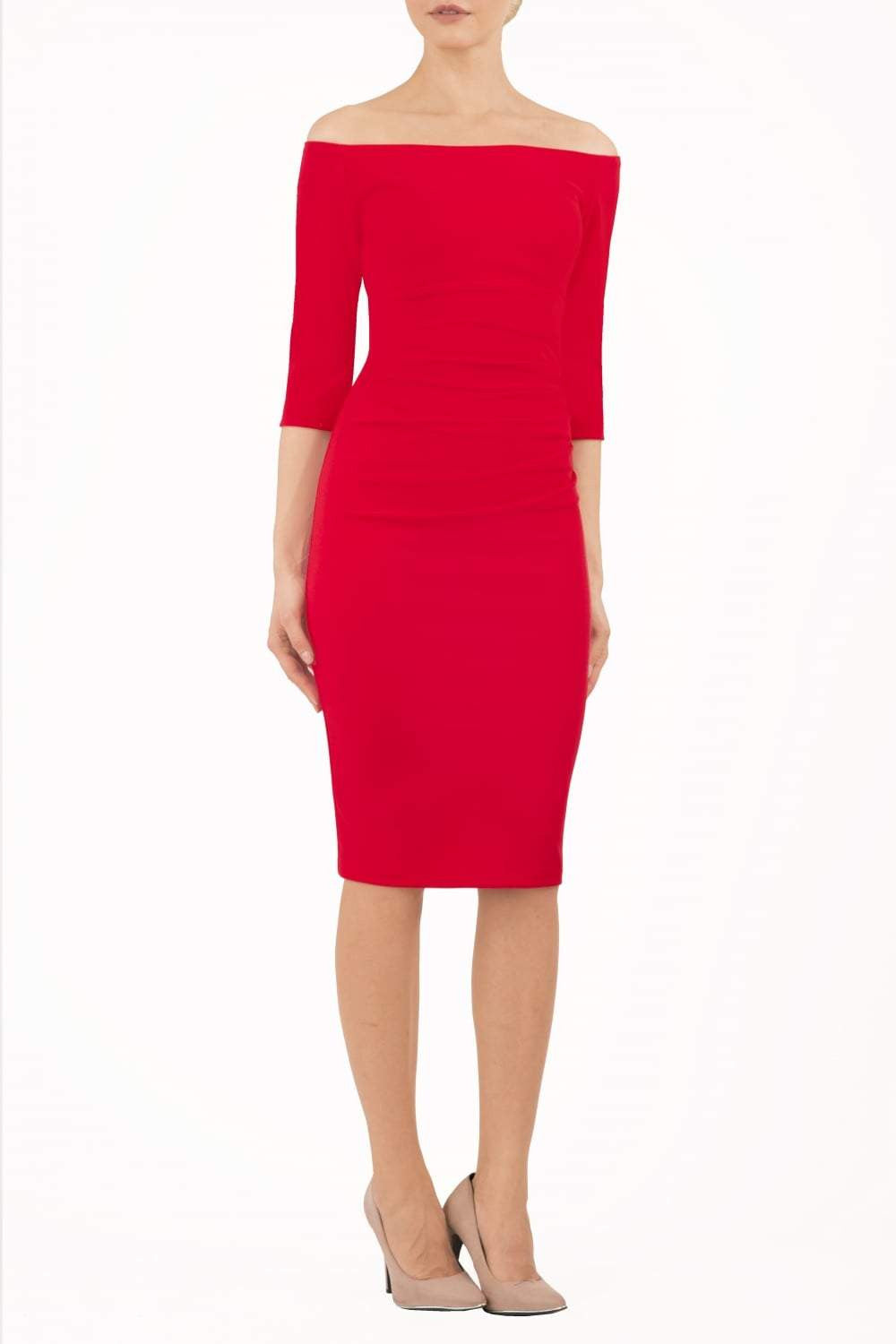 Model wearing the Diva Astra pencil dress with off shoulder design in true red front image 