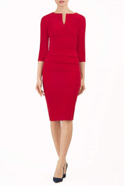Model wearing the Diva Daphne Venice Stretch Pencil dress with pleat detail across the front in tango red front image