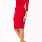 model wearing diva catwalk donna pencil dress in colour red with wide band and sleeves and rounded neckline with low split in front