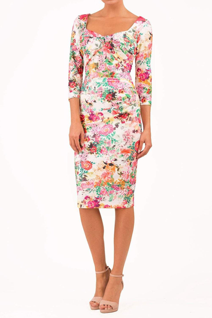 model wearing Symphony Marcella Tearose Floral Sleeved Pencil dress in print front