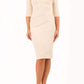 model is wearing diva catwalk ferndown pencil sleeved dress with sweetheart neckline in beige colour front