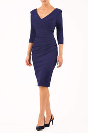 model is wearing diva catwalk eliza sleeved pencil dress with collared v-neck in navy blue front