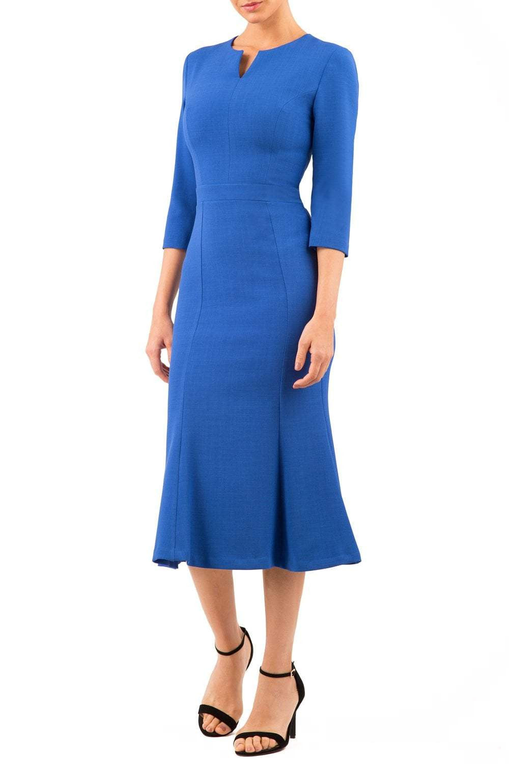 blonde model is wearing diva catwalk senne midaxi sleeved dress with fishtail and rounded neckline with a slit in the middle in royal blue front