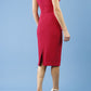 Model wearing the Diva Banbury gathered dress in bodycon pencil dress design in cerise red back