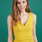 Model wearing the Diva Banbury gathered dress in bodycon pencil dress design in mustard yellow front