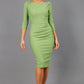 Model wearing the Seed Agatha in pencil dress design in green front image