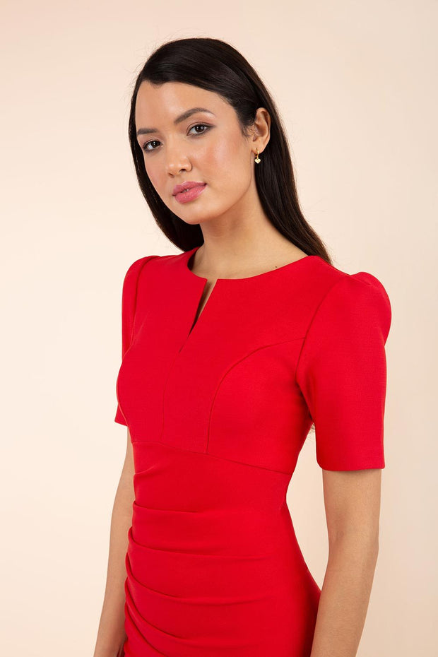 Model wearing pencil short sleeve seed fitzrovia dress front image