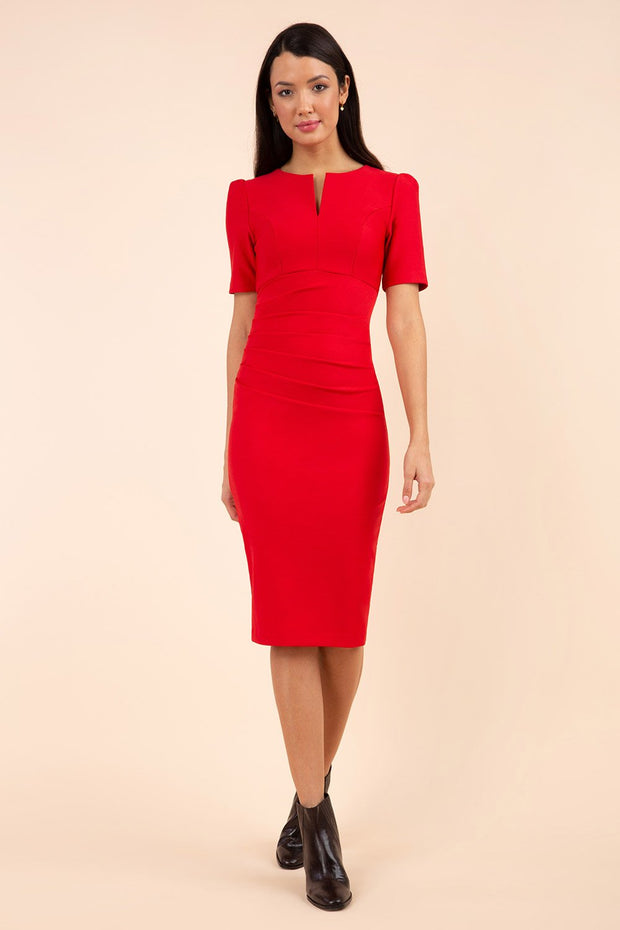 Model wearing pencil short sleeve seed fitzrovia dress front image