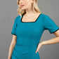 blonde model wearing seed albany contrasted pencil-skirt dress with short sleeves and pleating across the tummy with low square neckline and contrasted detail finishing in teal front
