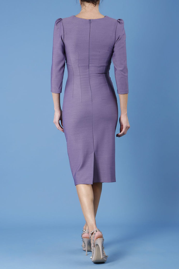 model is wearing diva catwalk seed fitzrovia sleeved pencil dress in dusky lilac back