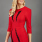 blonde model wearing seed lace red dress with sleeves and rounded necline with lace details pointing towards the band 
