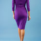 model is wearing diva catwalk donna sleeved pencil dress in passion purple back