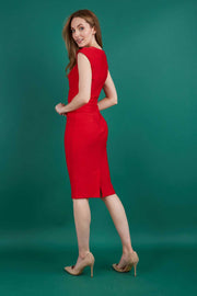 blonde model is wearing diva catwalk vivian sleeveless pencil skirt dress with overlapped bust area and lowered neckline in electric red colour back