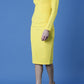 model is wearing diva catwalk cynthia long sleeve pencil dress with low v-neckline in freesia yellow front