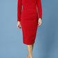 model is wearing diva catwalk cynthia long sleeve pencil dress with low v-neckline in scarlet red front