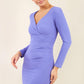model is wearing diva catwalk cynthia long sleeve pencil dress with low v-neckline in fusion indigo front