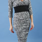 model is wearing diva catwalk stamford pencil dress with low v-neck and wide contrasting band in circle grey front