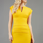 model wearing diva catwalk daphne sleeveless yellow cheap pencil dress with rounded neckline with split in the middle in front