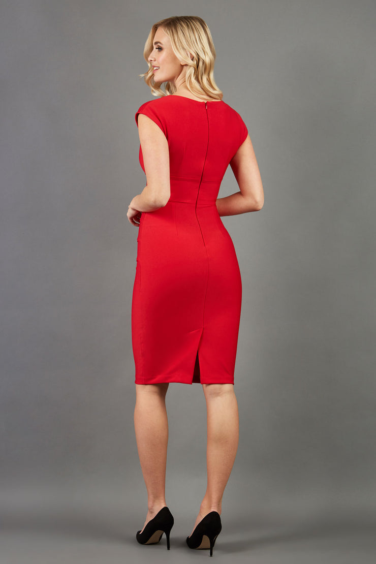 model wearing diva catwalk daphne sleeveless pencil skirt dress with rounded neckline with split in the middle in electric red colour back