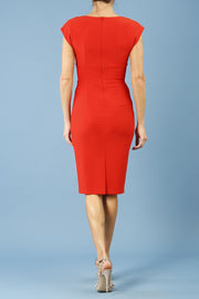 model wearing diva catwalk daphne sleeveless burn orange pencil dress with rounded neckline with split in the middle in front back