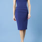 model wearing diva catwalk daphne sleeveless navy blue pencil dress with rounded neckline with split in the middle in front