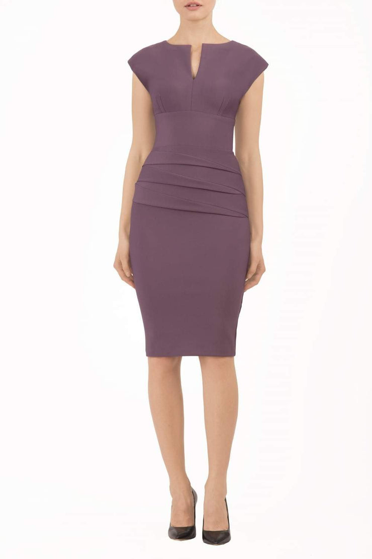 model wearing diva catwalk daphne sleeveless pencil skirt dress with rounded neckline with split in the middle in purple colour front