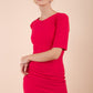 Model wearing the Diva Melbourne dress in pencil dress design in honeysuckle pink front image
