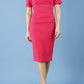Model wearing Diva Mollie pencil dress with short sleeve in honeysuckle pink front