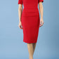 Model wearing Diva Mollie pencil dress with short sleeve in scarlet red front