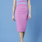 model is wearing duva catwalk banbury sleeveless colour block pencil dress with low v-neck in rosebud pink and vista blue front