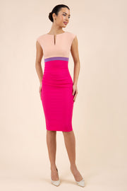 Brunette Model wearing sleeveless colour block Nadia dress with exposed zip at the back