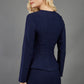 blonde model is wearing seed diva dawlish navy pencil skirt paired with jacket in navy back