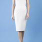 model is wearing diva catwalk seed cadiz pencil sleeveless dress in sandy cream front