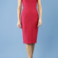 model is wearing diva catwalk seed cadiz pencil sleeveless dress in crimson pink front