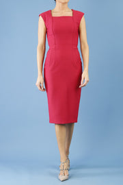 model is wearing diva catwalk seed cadiz pencil sleeveless dress in crimson pink front