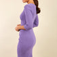 Model wearing the Diva Daphne Venice Stretch Pencil dress with pleat detail across the front in lavender purple back image