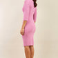 Model wearing the Diva Daphne Venice Stretch Pencil dress with pleat detail across the front in cashmere pink back image