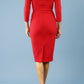 model is wearing seed rowena pencil dress with sleeves and square neckline in salsa red back
