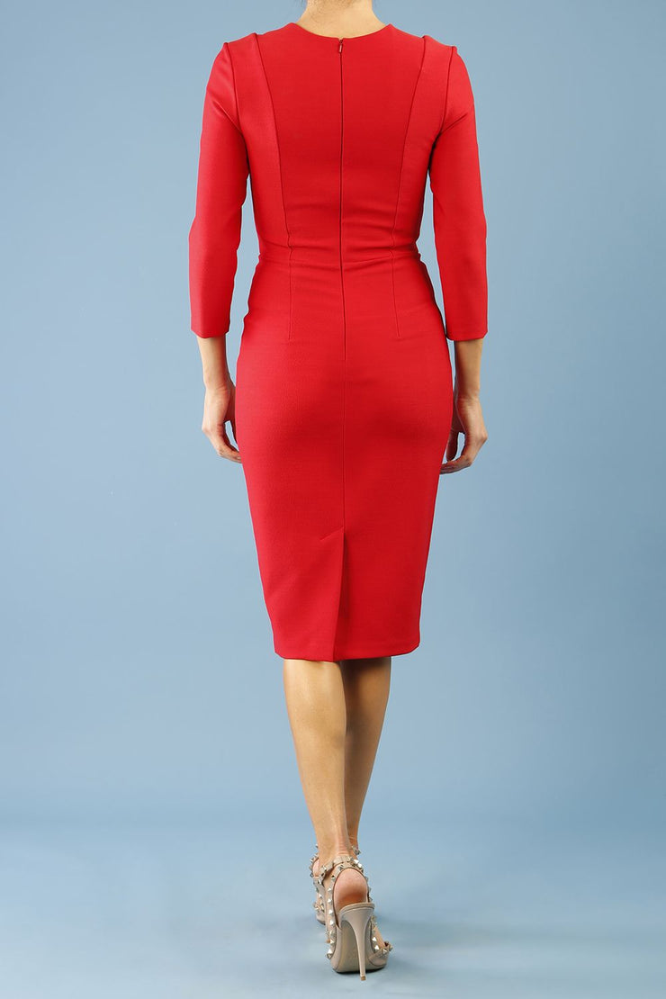 model is wearing seed rowena pencil dress with sleeves and square neckline in salsa red back