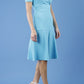 model is wearing diva catwalk madison a-line dress with square neckline and short sleeve in celestial blue front