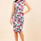 Model wearing the Diva Serenity Palm dress in pencil dress design in palm print front image