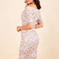 Model wearing the Diva Paradise Tudor Vine dress in pencil dress design in tudor vine print back image