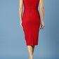 model is wearing diva catwalk seed fitzrovia sleeveless pencil dress in cardinal red back