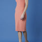 brunette model is wearing diva catwalk odessa pencil sleeveless dress with frill detail on rounded neckline in dusty coral front