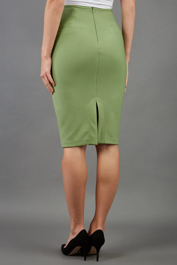 blonde model is wearing diva catwalk pencil skirt in aspen green back
