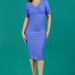 model is wearing diva catwalk seed barton short sleeve pencil dress with v-neck in dawn indigo front 