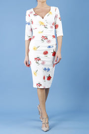Model wearing the Diva Cynthia Floral Print dress with pleating across the front in buttercup print front