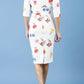 Model wearing the Diva Cynthia Floral Print dress with pleating across the front in buttercup print back