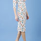 Model wearing the Diva Cynthia Floral Print dress with pleating across the front in linear tulip print front